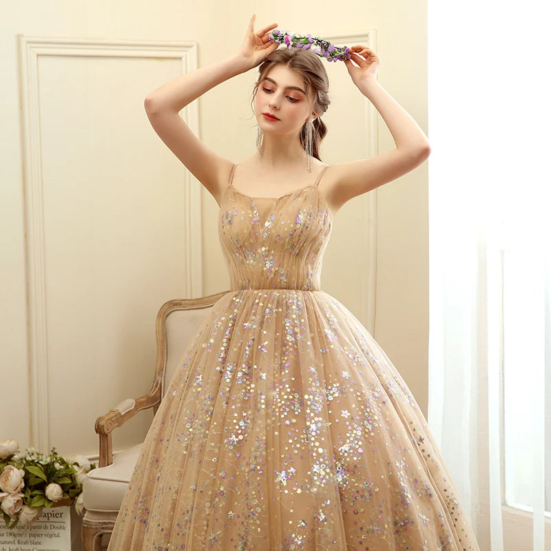 Robe de soirée et de bal Feishiluo pour femme, style moderne, ligne A, longueur ras du sol, avec appliques, décolleté en cœur et dos nu