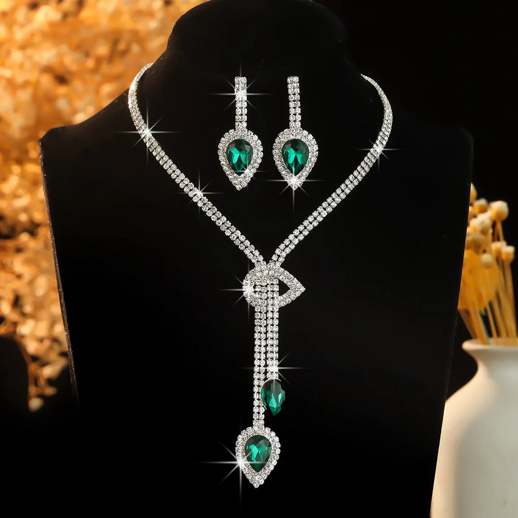 Parure collier et boucles d'oreilles goutte d'eau en cristal bleu saphir