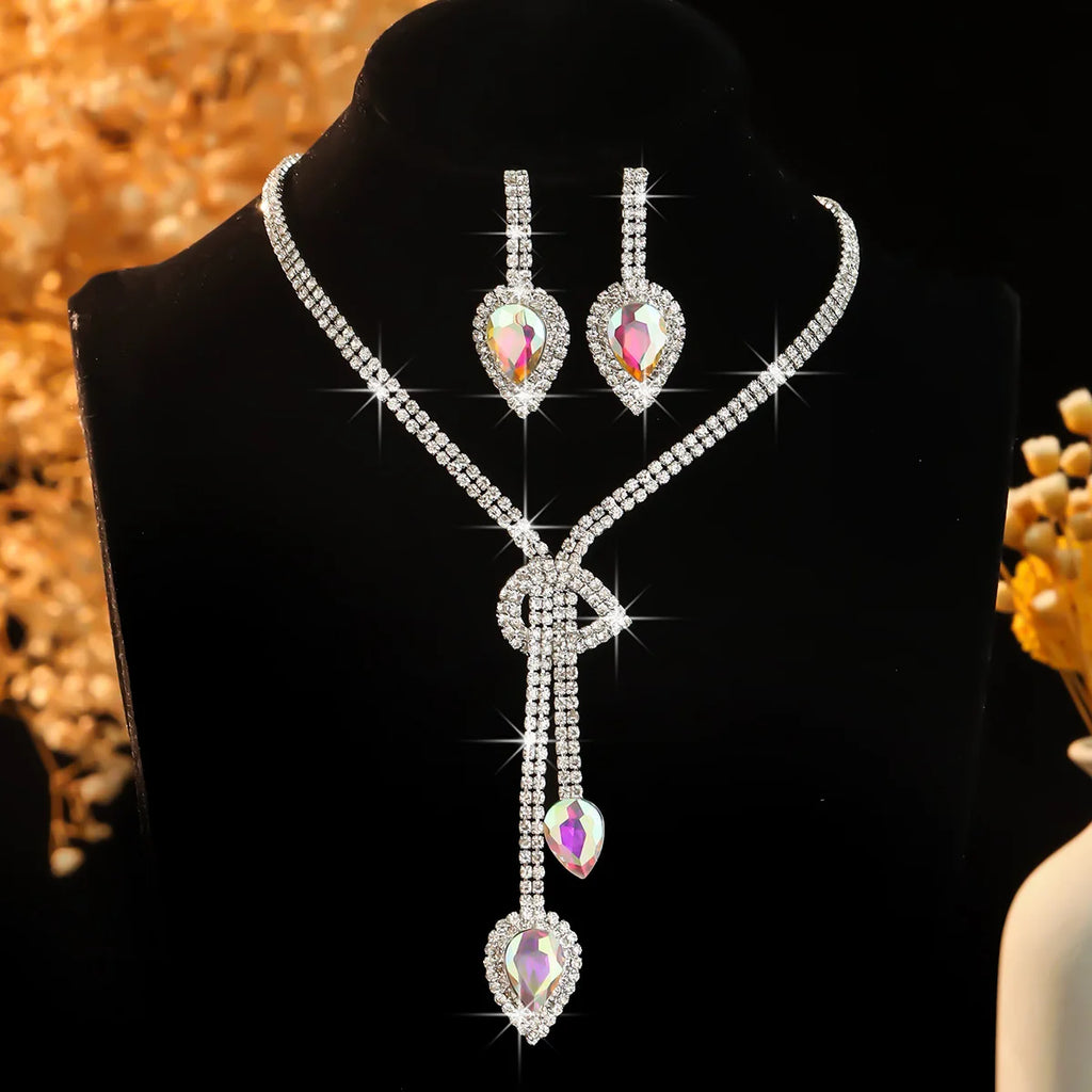 Parure collier et boucles d'oreilles goutte d'eau en cristal bleu saphir
