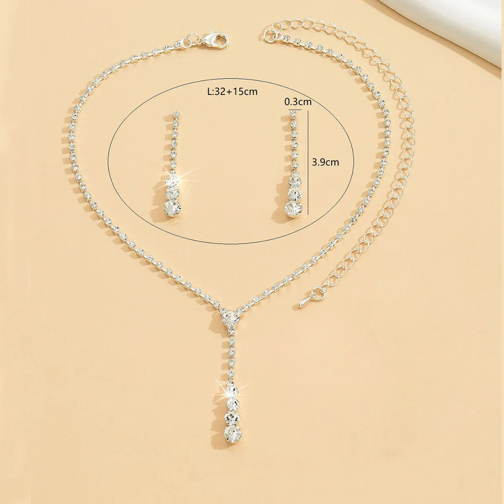Parure collier et boucles d'oreilles de mariée Goutte de cristal scintillant