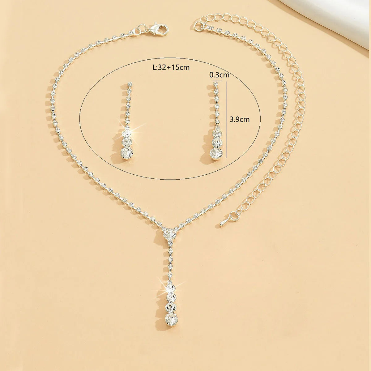 Parure collier et boucles d'oreilles de mariée Goutte de cristal scintillant